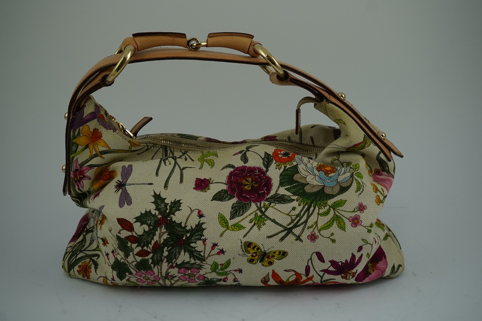 A Gucci flora canvas horse-bit hobo bag with dust bag